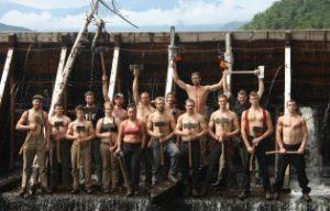 members of the 2012 Appalachian Mountain Club Trail Crew gathered for a group shot with axes