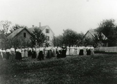 Plymouth State in 150 Objects exhibition 1900s scrapbook students outdoors