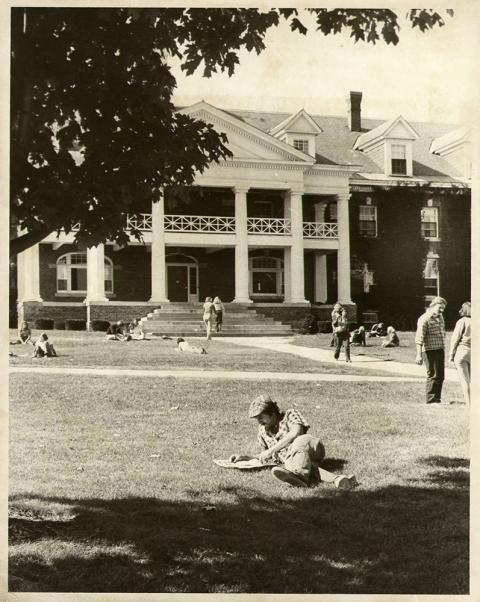 Plymouth State in 150 exhibition 1970s people relaxing on Mary Lyon lawn