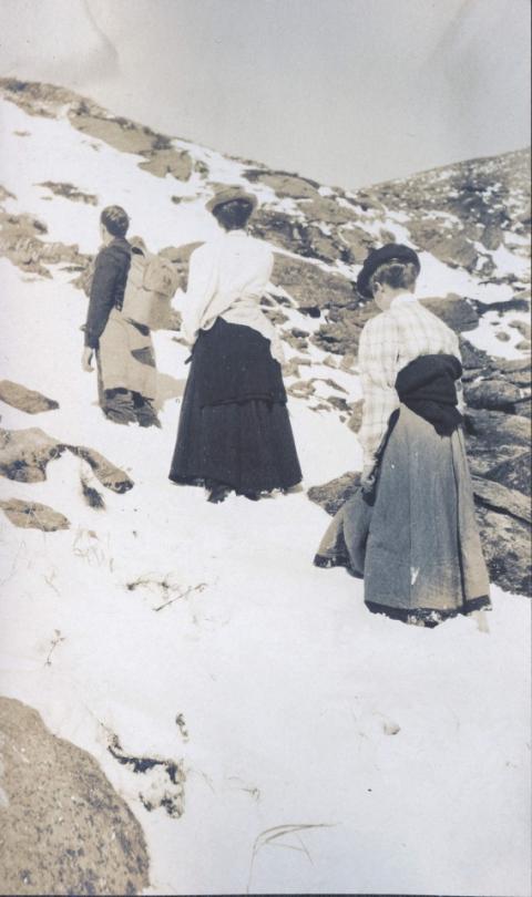 Three women trekking up Mount Washington in 1905