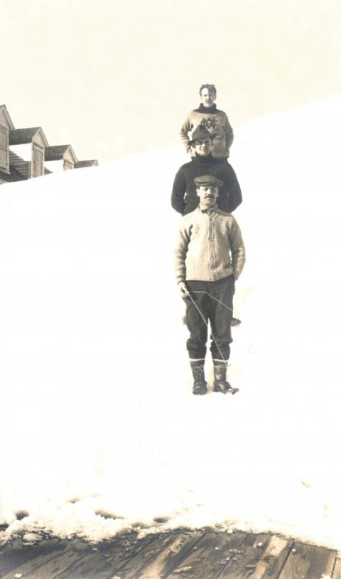 three men posing on a Trek to Mt. Washington 