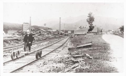 J.E. Henry riding a ‘jigger’ car or ‘track cycle’ in Lincoln, NH, c.1906