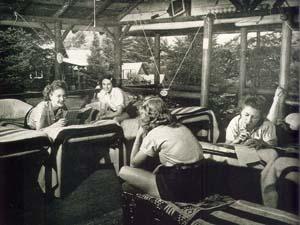Campers resting in bunk beds