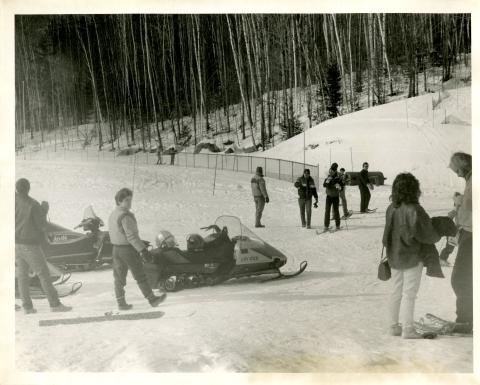 Photograph of snowmobiles.