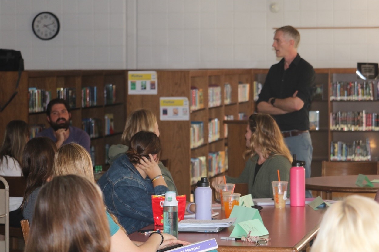 Plymouth State University Professor Kenneth Logan teaching a master’s degree course in the Franklin Middle School