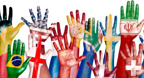 hands with International flags