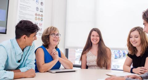 faculty and students in class