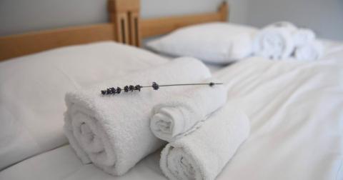 clean towels on guest bed