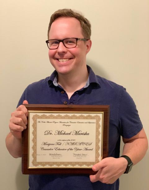 Mike Mariska with award