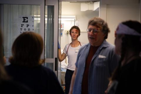 nursing students participating in a disaster simulation