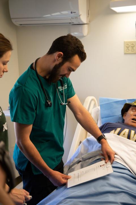 nursing students participating in a disaster simulation