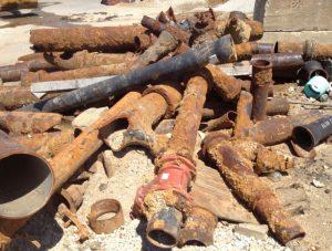 A pile of old rusted, corroded pipes in Portsmouth, NH