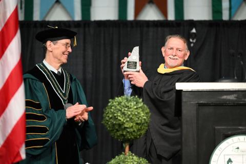 Graduate keynote speaker Dave Anderson '85 received the Granite State Award, presented by President Donald Birx