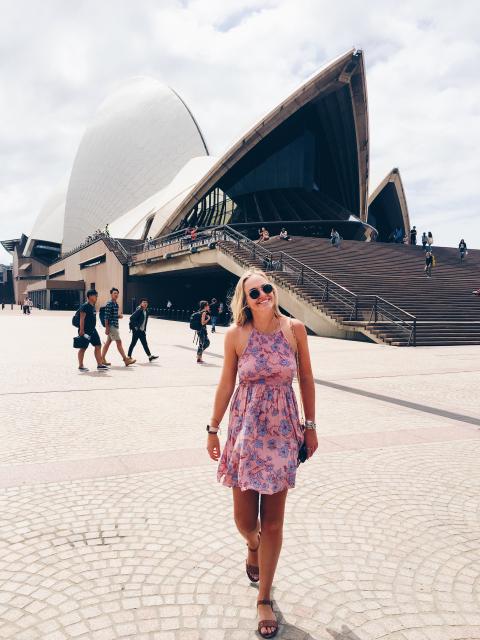 Student in front of the Sydney Opera House.