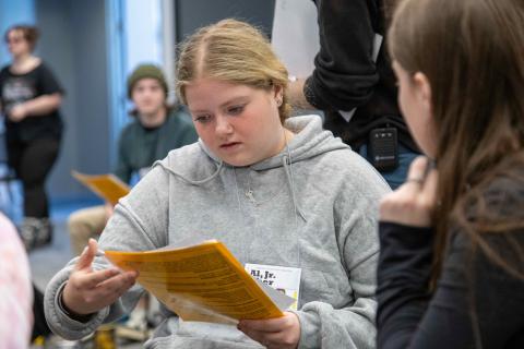 Student discussing with another student 