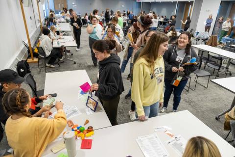 Students attending the poverty simulation event